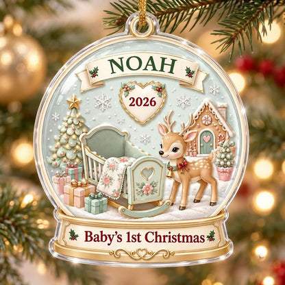 Acrylic snowglobe ornament with Baby's 1st Christmas, fawn with red bow, cradle, tree, gifts and gingerbread house