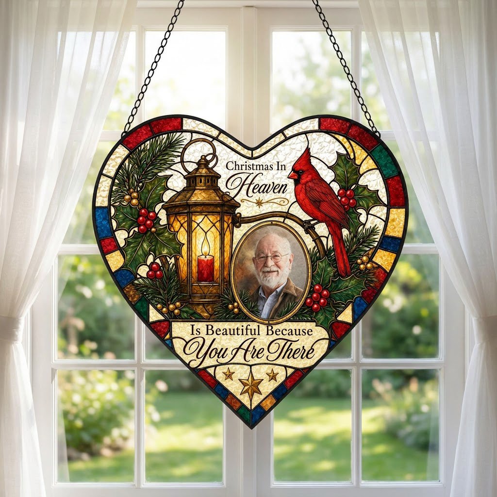 Heart stained glass suncatcher with lantern, red candle, red cardinal, holly, pine, and an oval photo frame.