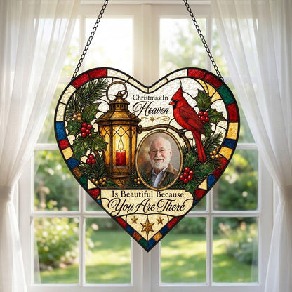 Heart stained glass suncatcher with lantern, red candle, red cardinal, holly, pine, and an oval photo frame.