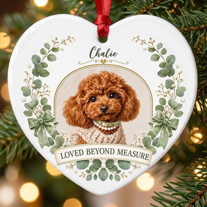 Heart ceramic ornament with dog photo in gold frame, eucalyptus wreath, green bows and 'LOVED BEYOND MEASURE' text