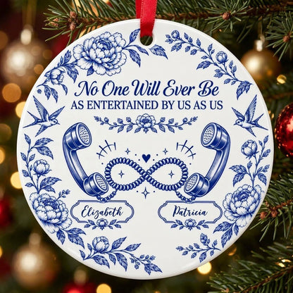 Blue toile round ornament with crown, swallows, vintage phones in an infinity and two name banners