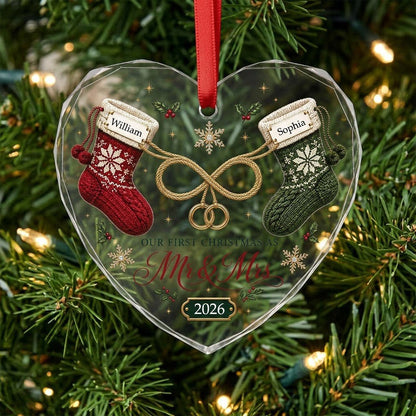 Heart glass ornament with red and green knit stockings, gold infinity loop with rings, Mr & Mrs text, names and date.