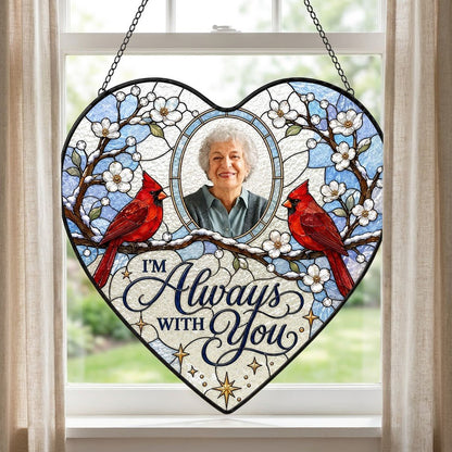 Heart suncatcher with two red cardinals on snowy branches, round photo window, and the words I'M Always WITH You.