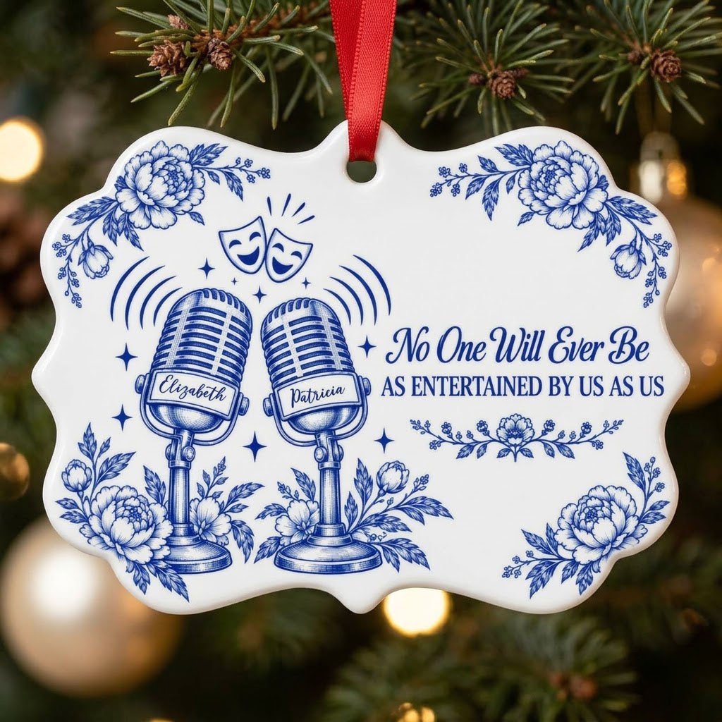 White ceramic ornament with cobalt blue vintage microphones, comedy and tragedy masks, stars and florals with two names.