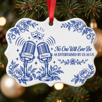 White ceramic ornament with cobalt blue vintage microphones, comedy and tragedy masks, stars and florals with two names.