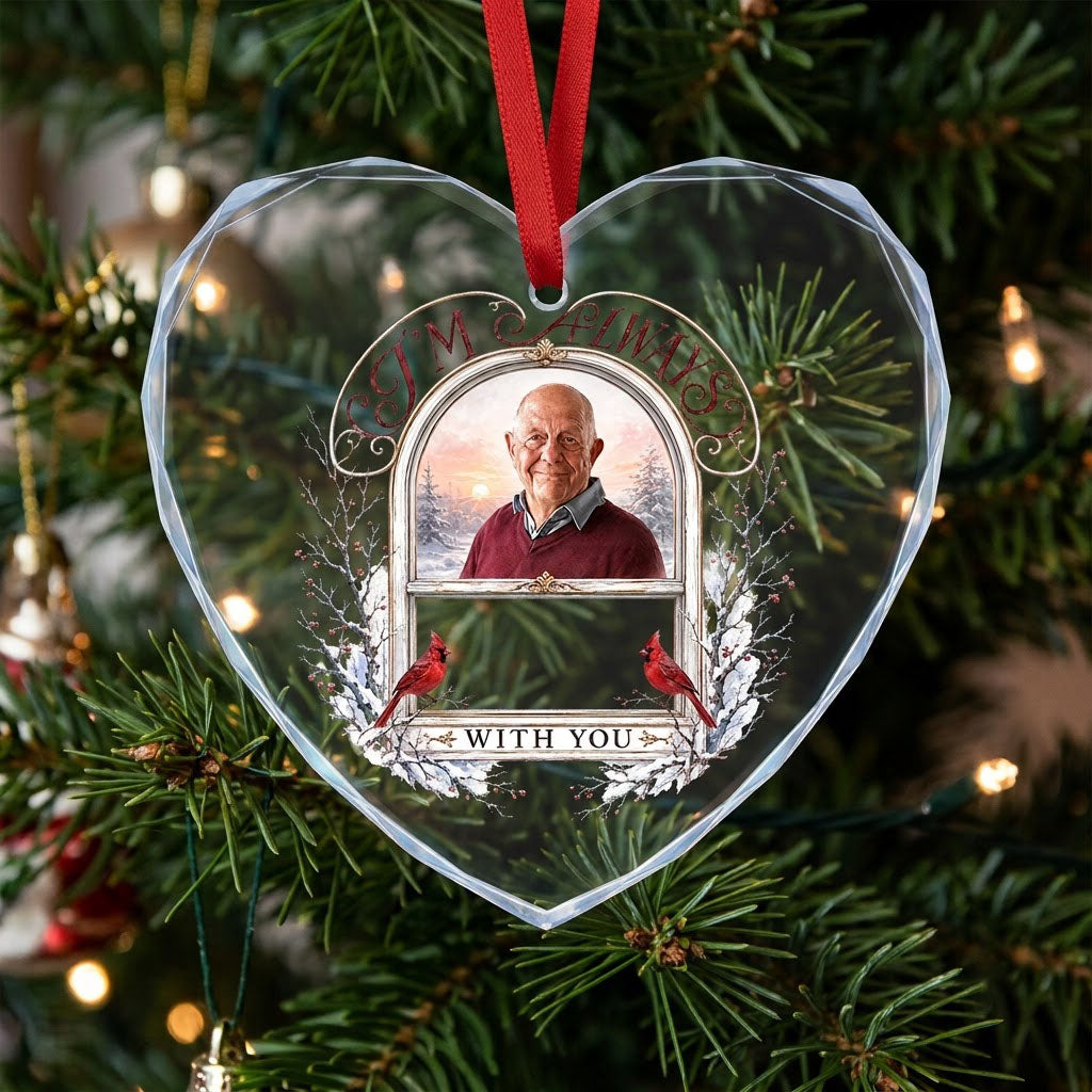 Heart-shaped glass ornament with red cardinals, arched photo window, and I'M ALWAYS WITH YOU text on a snowy winter scen