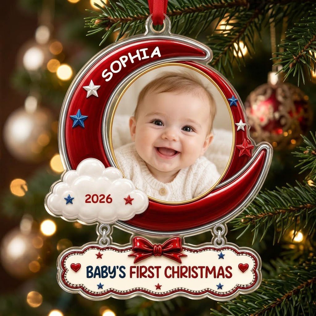 Red crescent moon acrylic ornament with baby photo, cloud, stars, and a plaque reading Baby's First Christmas.
