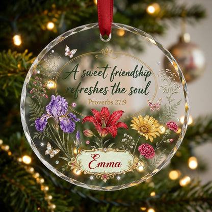Round faceted glass ornament with florals, gold accents, butterflies, and 'A sweet friendship refreshes the soul'.