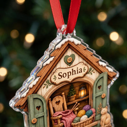 House-shaped acrylic ornament with cozy knitting shed scene and 'Just a Girl Who Loves Knitting' text.