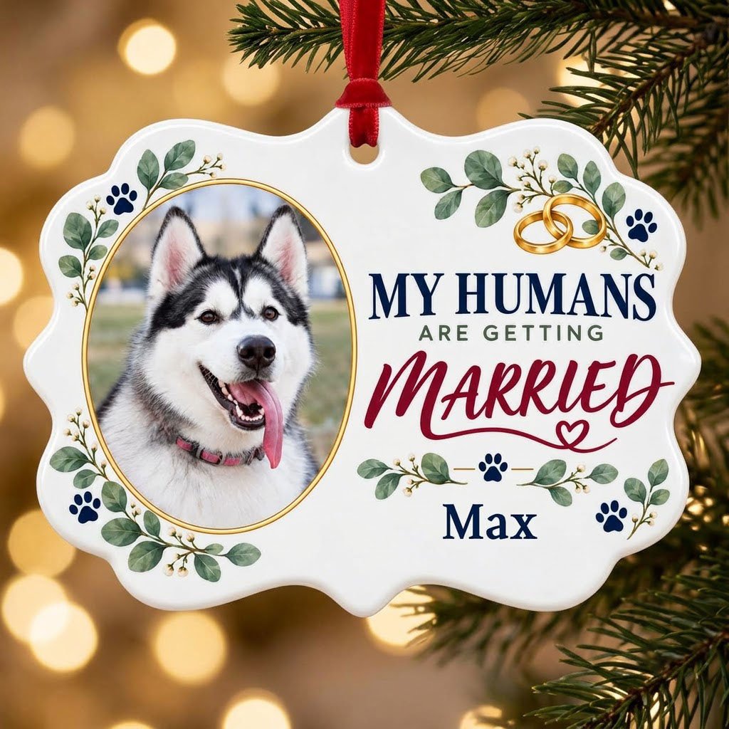 Scalloped medallion ornament with dog photo, eucalyptus, paw prints, and 'MY HUMANS ARE GETTING MARRIED' text.