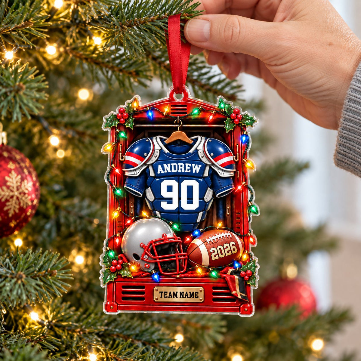 Acrylic ornament shaped like a football locker with jersey, helmet, football, lights and holly, personalized for a playe