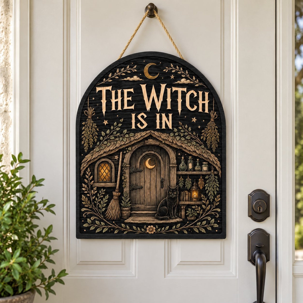 Arch wood sign with "THE WITCH IS IN", witch cottage, black cat, broom, herbs and lantern details.