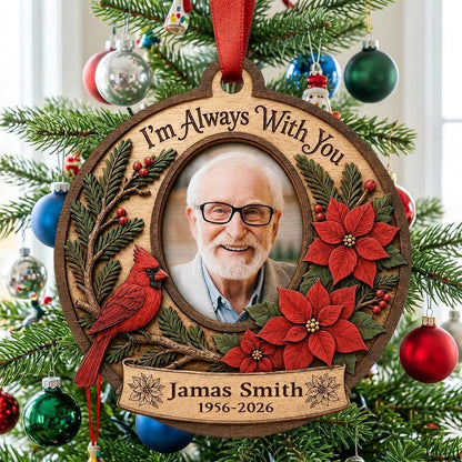 Bauble-shaped wood ornament with oval photo frame, red cardinal, pine, berries, and poinsettias with ribbon banner