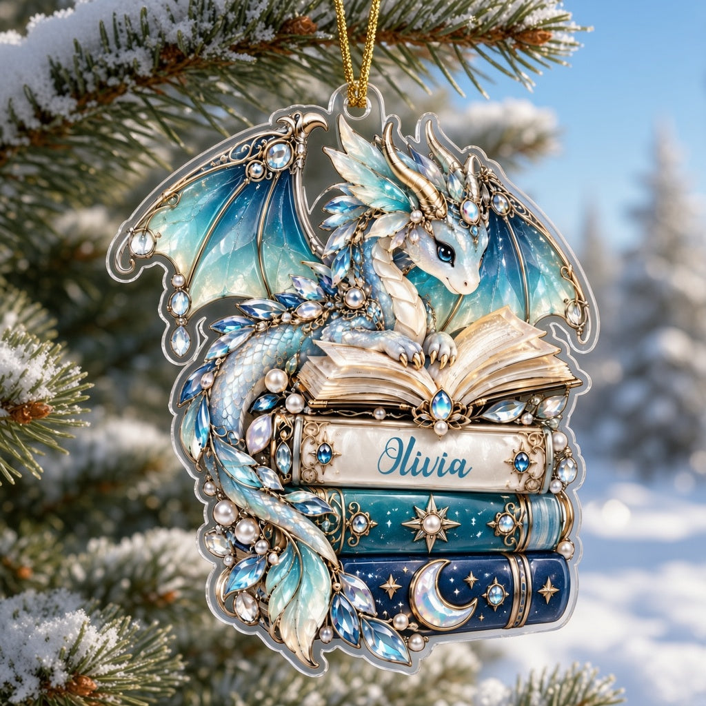 Custom-cut acrylic ornament of a jeweled blue dragon on stacked books with a red ribbon and a personalized name.