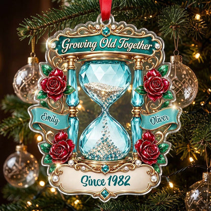 Custom-cut acrylic ornament with jeweled hourglass, red roses, and the words 'Growing Old Together'.