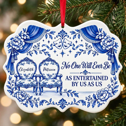 Blue-and-white ceramic ornament with theater masks, vintage chairs, Delft florals, and draped curtains.
