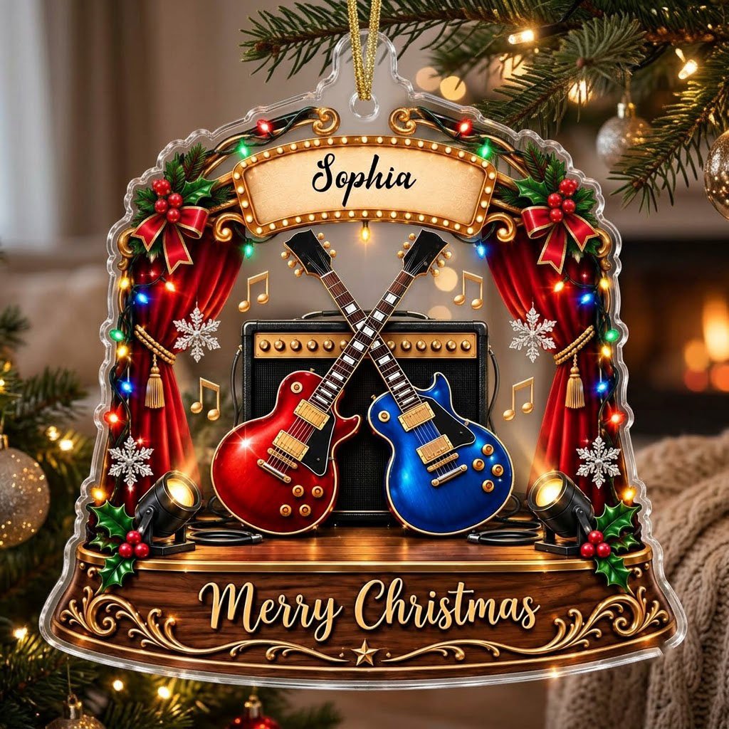 Custom-cut acrylic ornament with crossed red and blue guitars, Merry Christmas marquee, curtains and holly.