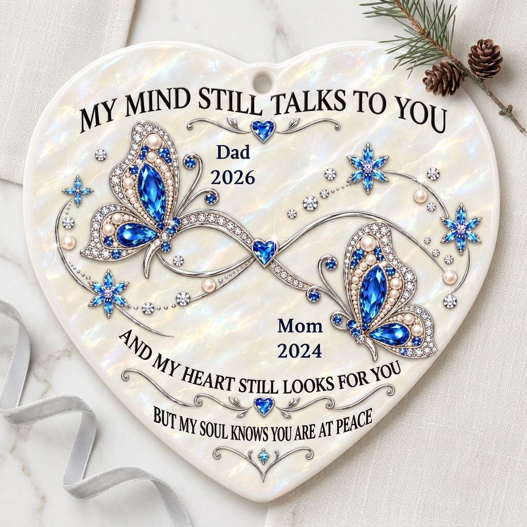 Heart ceramic ornament with blue jeweled butterflies, a silver infinity, and quote 'My Mind Still Talks To You'.