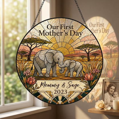 Stained glass-style mother and baby elephants at sunrise with 'Our First Mother's Day' text.