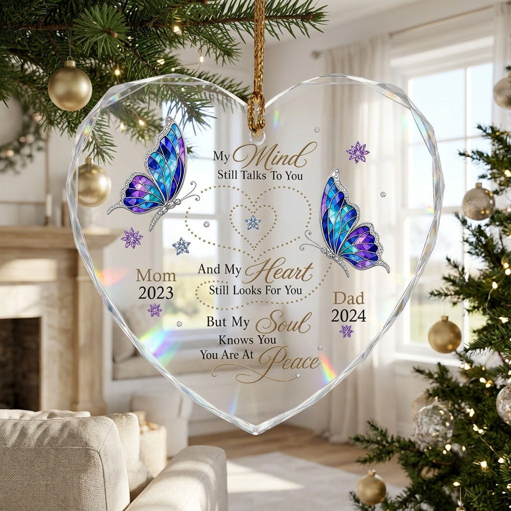 Heart glass ornament with two stained-glass butterflies, dotted heart trails, snowflakes, and a memorial quote.