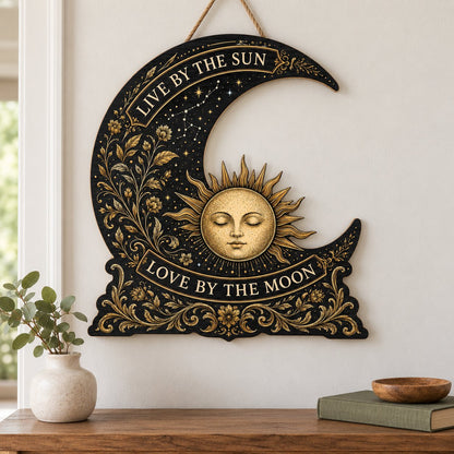 Crescent moon and sleeping sun wooden sign with gold constellations and words Live by the Sun, Love by the Moon.
