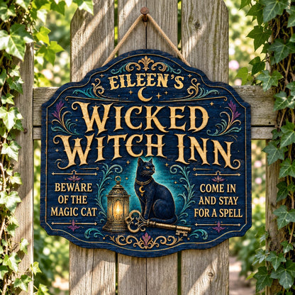 Custom-cut wooden sign with black cat, glowing lantern, golden key, crescent moons, stars, and Wicked Witch Inn text