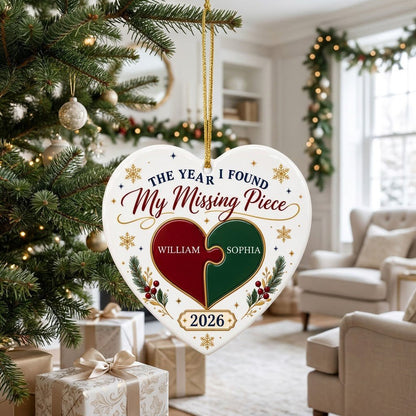 Heart ceramic ornament with red and green interlocking puzzle heart, gold snowflakes and stars, pine sprigs, and custom 