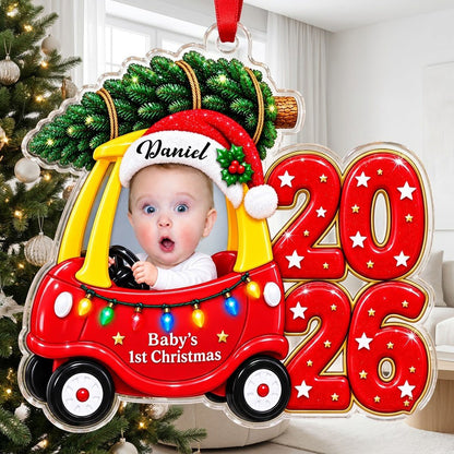 Acrylic ornament shaped like a toy car with tree, Baby's 1st Christmas text, lights, and a baby photo.