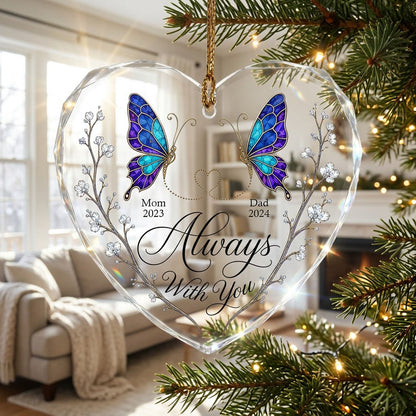 Heart-shaped glass ornament with stained-glass butterflies, gold dotted heart, and white-flower vines.