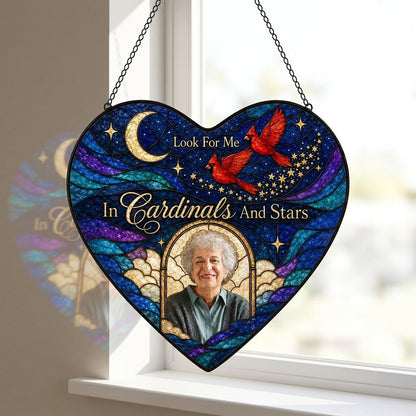 Heart-shaped stained glass suncatcher with night sky, moon, stars, two red cardinals, and a golden photo frame.
