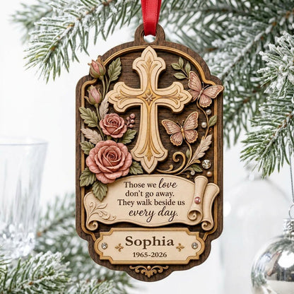 Ornate arch wood ornament with carved cross, roses, butterflies and memorial quote with name and dates.