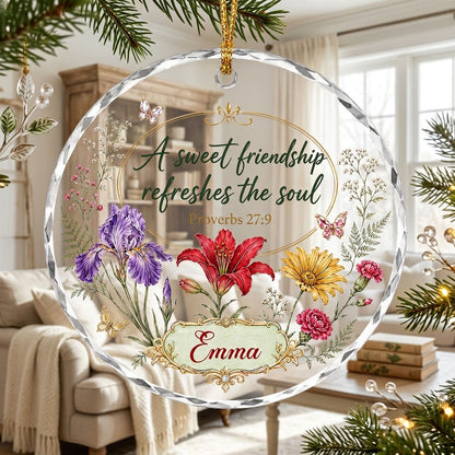 Round faceted glass ornament with florals, gold accents, butterflies, and 'A sweet friendship refreshes the soul'.
