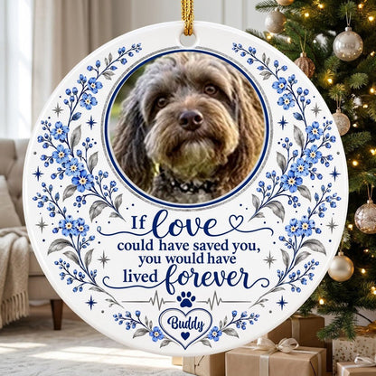 Round ceramic ornament with pet photo, blue forget-me-not florals, paw heartbeat line, and memorial quote.