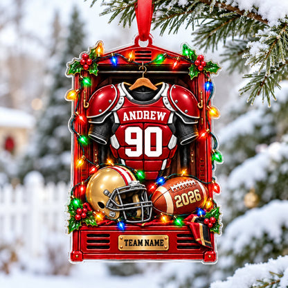 Acrylic ornament with a red football locker, jersey on hanger, gold helmet, brown football and gold plaque