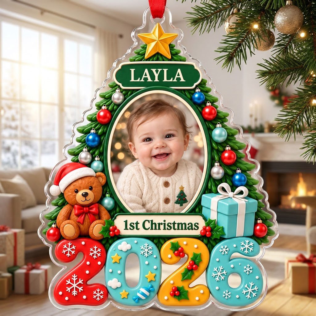 Green Christmas tree acrylic ornament with star topper, baby photo frame, teddy bear, and 2026 numbers.