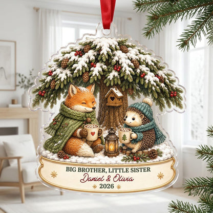 Acrylic ornament with snowy tree, fox and hedgehog holding mugs, banner says BIG BROTHER, LITTLE SISTER.