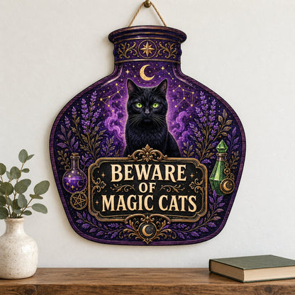 Potion bottle-shaped wooden sign with a black cat, moon, stars, lavender, and the text 'BEWARE OF MAGIC CATS'