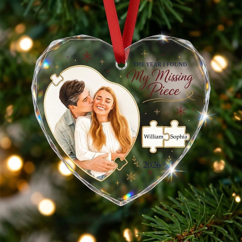 Heart glass ornament with gold puzzle pieces, couple photo, snowflakes, reading THE YEAR I FOUND My Missing Piece.