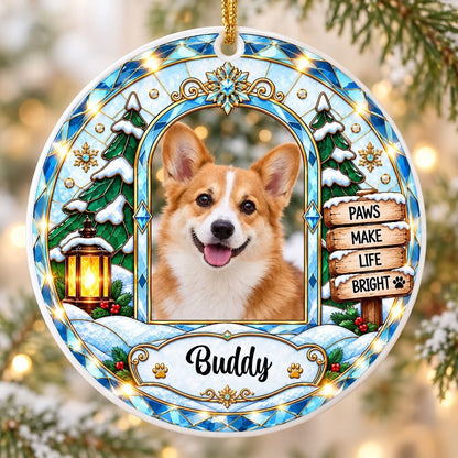 Round ceramic ornament with blue and gold stained-glass border, dog photo center, snow tree, gold lantern, holly, signpo