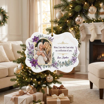 Gold frame photo with purple clematis and the quote 'Mom, I am who I am today as a reflection of you.'
