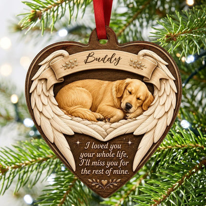 Heart-shaped wood ornament with a sleeping golden retriever, angel wings, ribbon banner, stars, and a memorial quote.