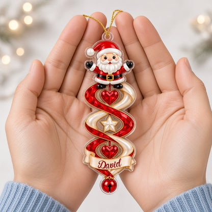 Custom-cut acrylic ornament with snowman or Christmas tree, spiral ribbon, gem hearts, and a name banner with bell.