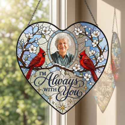 Heart suncatcher with two red cardinals on snowy branches, round photo window, and the words I'M Always WITH You.
