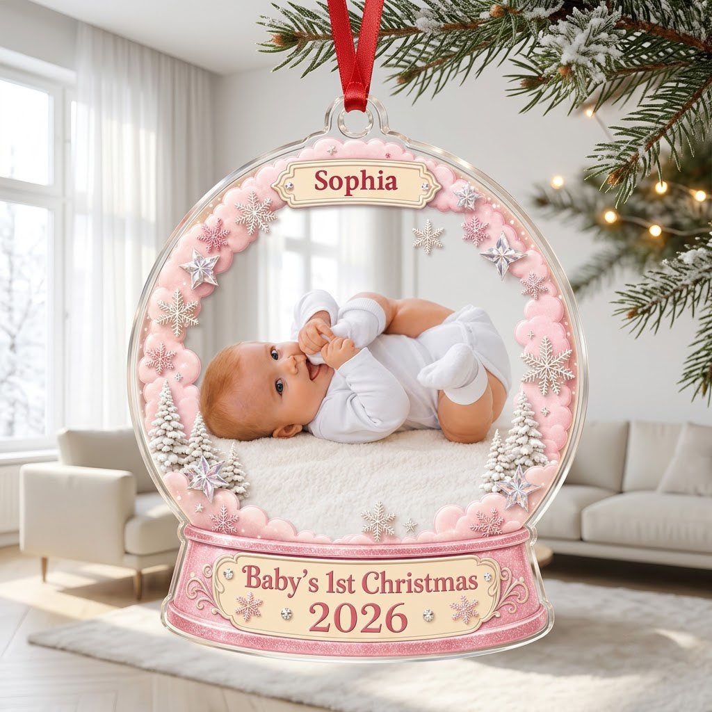 Pink snow globe acrylic ornament with "Baby's 1st Christmas", name banner, year base, and baby photo frame