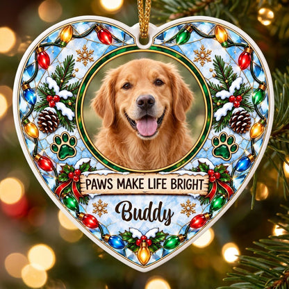 Heart ceramic ornament with dog photo frame, “PAWS MAKE LIFE BRIGHT”, lights, pine branches, paw prints, and red ribbon 