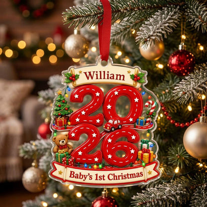 Custom-cut acrylic ornament with 'Baby's 1st Christmas', road-style 2026, holly banners, teddy bear and toy car.