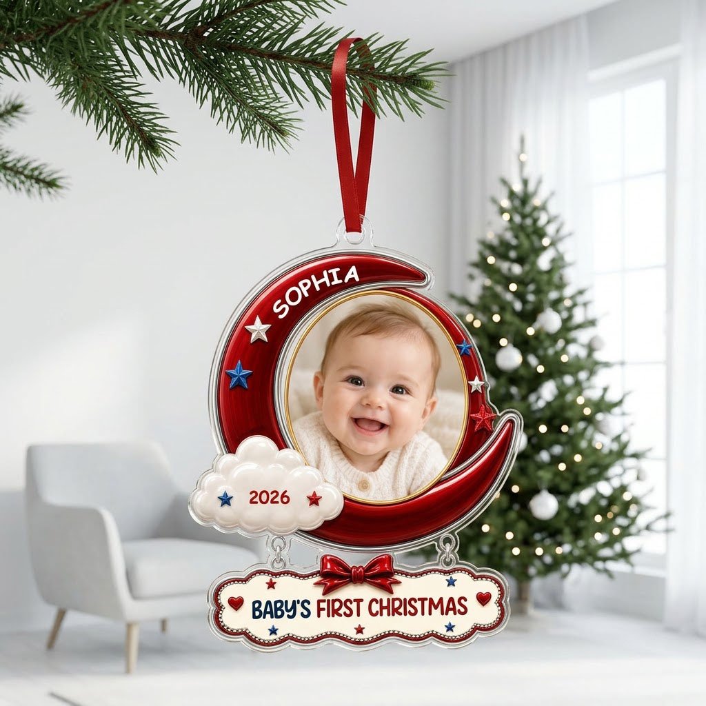 Red crescent moon acrylic ornament with baby photo, cloud, stars, and a plaque reading Baby's First Christmas.