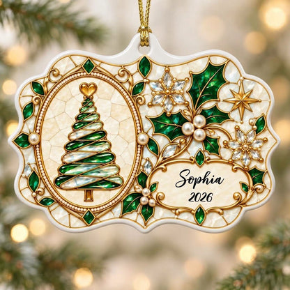 Scalloped ceramic ornament with emerald swirl tree, gold filigree, pearl accents, and a name-and-year cartouche.