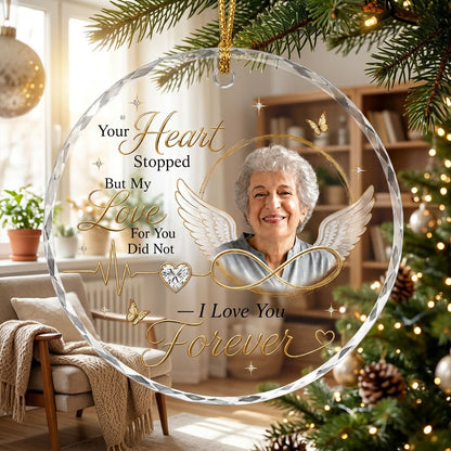 Round ornament with angel wings, photo circle, infinity symbol, heartbeat line to heart, and butterflies.