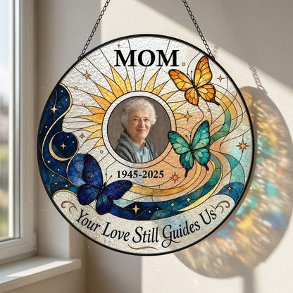 Round stained glass-style suncatcher with a photo frame, three butterflies, a crescent moon, sunburst rays and a banner 